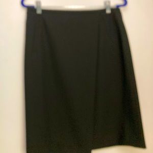 Short black skirt wrap look.